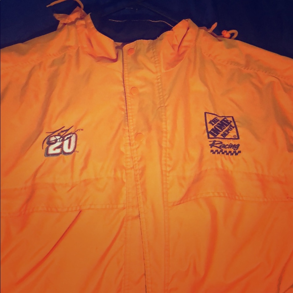 This is a Home Depot racing jacket in the size XL.